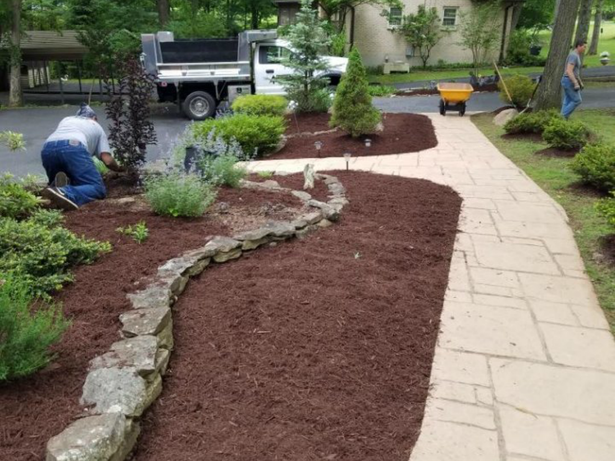 Completed landscaping project with fresh mulch
