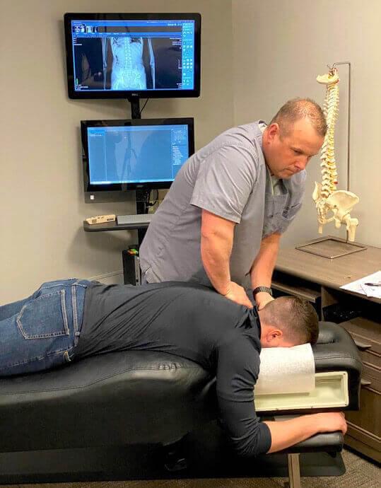 Centennial chiropractor doing an adjustment